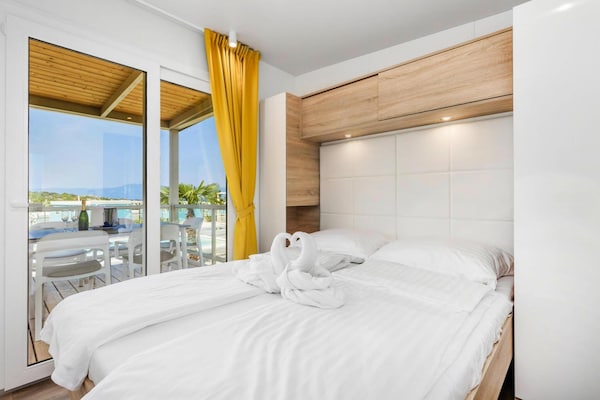 Foto van Stacaravan in Omisalj bij Pusca Bay Strand - Vakantiehuis in Omisalj - BedRoom