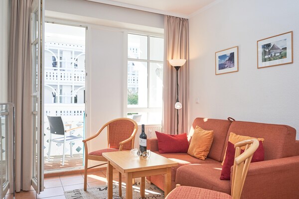 Foto van Charmant vakantieappartement voor 3 personen met balkon in Seepark Sellin - LivingRoom