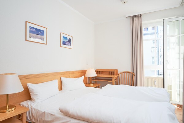 Foto van Charmant vakantieappartement voor 3 personen met balkon in Seepark Sellin - BedRoom