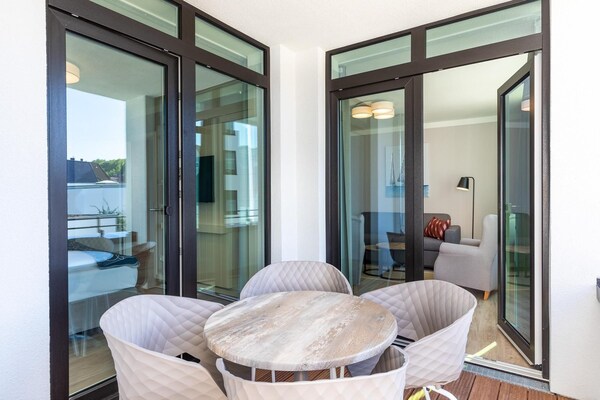 Foto van Appartement vlakbij strand en park - Vakantiehuis in Travemünde - TerraceBalcony