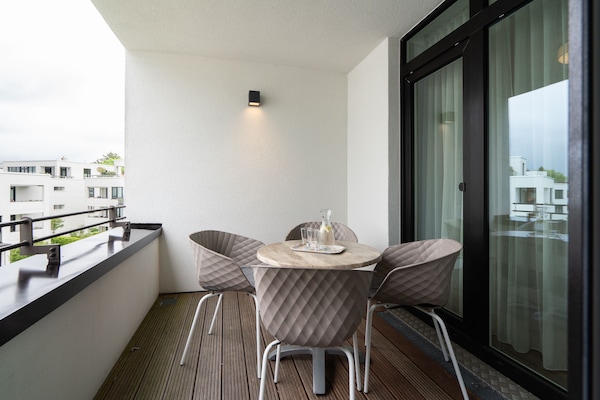 Foto van Bright Beach-Chair Baltic Suite - Vakantiehuis in Travemünde - TerraceBalcony