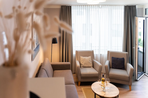 Foto van Bright Beach-Chair Baltic Suite - Vakantiehuis in Travemünde - LivingRoom