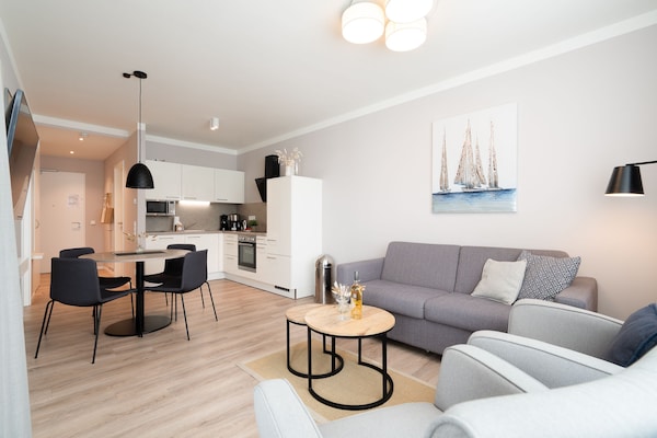 Foto van Bright Beach-Chair Baltic Suite - Vakantiehuis in Travemünde - LivingRoom