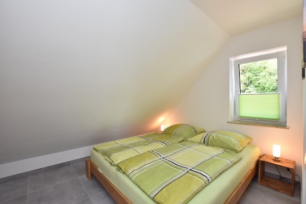 Foto van Rustiek toevluchtsoord met open haard - Vakantiehuis in Damshagen - BedRoom