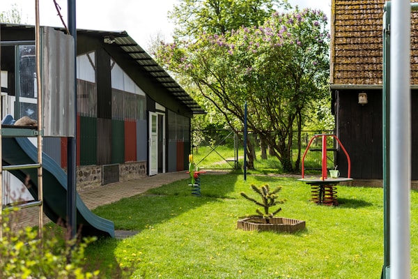 Foto van Gezinsvriendelijk huis met tuin - Vakantiehuis in Pravtshagen - ExteriorSummer