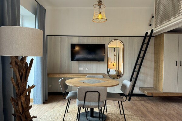 Foto van Appartement in het Wangerland Resort - Vakantiehuis in Hohenkirchen - LivingRoom