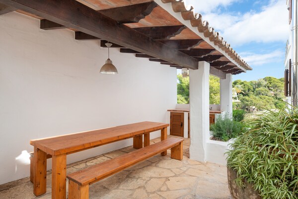 Foto van Villa in Cala d'Or met privé strandtoegang - Vakantiehuis in Cala D'or, Illes Balears - TerraceBalcony