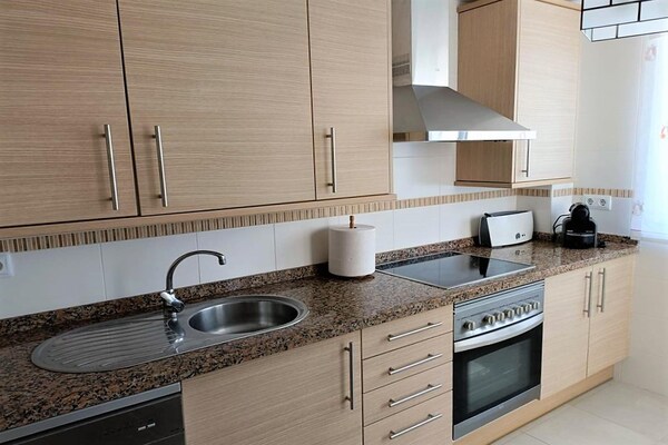 Foto van Appartement met zwembad - Vakantiehuis in Roquetas de Mar - Kitchen