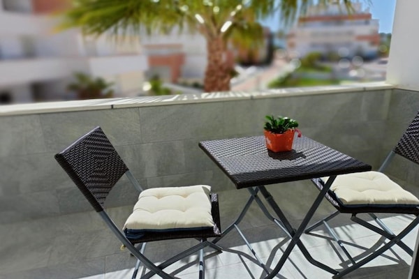 Foto van Appartement met zwembad - Vakantiehuis in Roquetas de Mar - TerraceBalcony