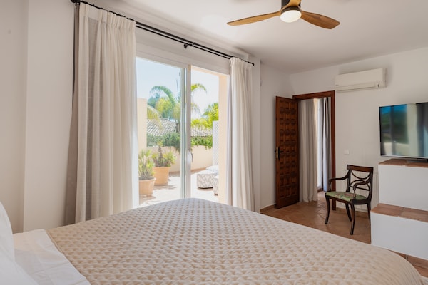 Foto van Charmante Andalusische strandvilla - Vakantiehuis in Marbella - Landing