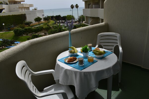 Foto van Appartement met strandzicht - Vakantiehuis in Benalmádena - TerraceBalcony