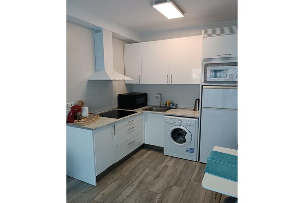 Foto van Appartement met strandzicht - Vakantiehuis in Benalmádena - Kitchen