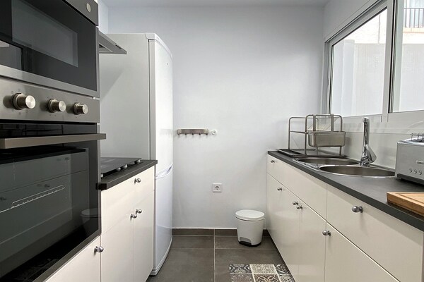 Foto van Vakantiehuis in Nerja bij Playa Carabeillo - Vakantiehuis in Nerja - Kitchen