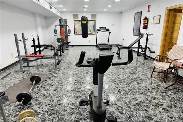Foto van Eenpersoonskamer in het Albohera Playa Hotel - Vakantiehuis in Santiago de la Ribera - gym