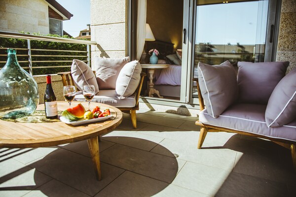 Foto van Villa in Sanxenxo met Zeezicht en Zwembad - Vakantiehuis in Pontevedra - TerraceBalcony