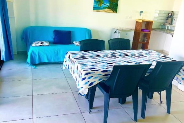 Foto van Manapany familieappartement vlakbij de zee - Vakantiehuis in Saint-Joseph, La Reunion - LivingRoom