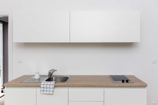 Foto van Apartments Villa Karmen - Comfort One-Bedroom Apartment with Terrace (Marine) - Kitchen