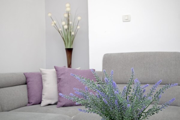 Foto van Apartments Isabora - Two-Bedroom Apartment with Terrace and Partial Sea View (Nea) - LivingRoom