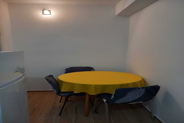 Foto van Apartments Kalajzic - Two Bedroom Apartment with Garden and Terrace(A2) (ST) - DiningRoom