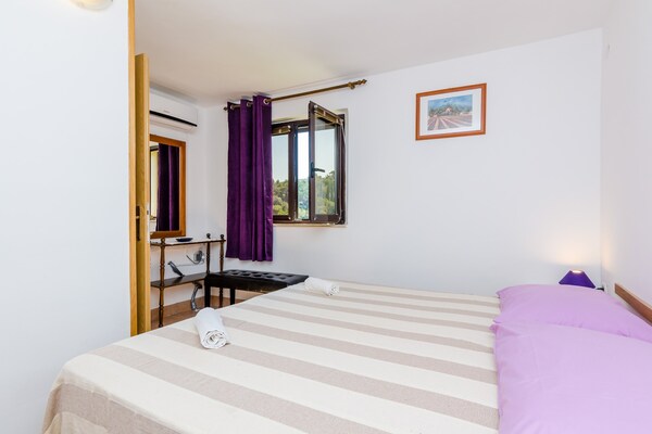 Foto van Apartments & Rooms Mihajica- Two Bedroom Apartment with Balcony and Sea View - BedRoom