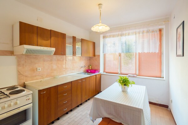 Foto van Apartments Sany- Two Bedroom Apartment with Balcony and Sea View - DiningRoom