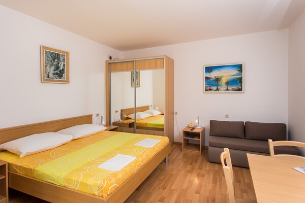 Foto van Apartments Bibijana- Premium Studio Apartment with Patio and Sea View (APARTMAN 3) - LivingRoom