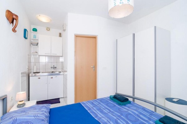 Foto van Apartments Ammos - Studio Apartment with Shared Terrace and Sea View - BedRoom