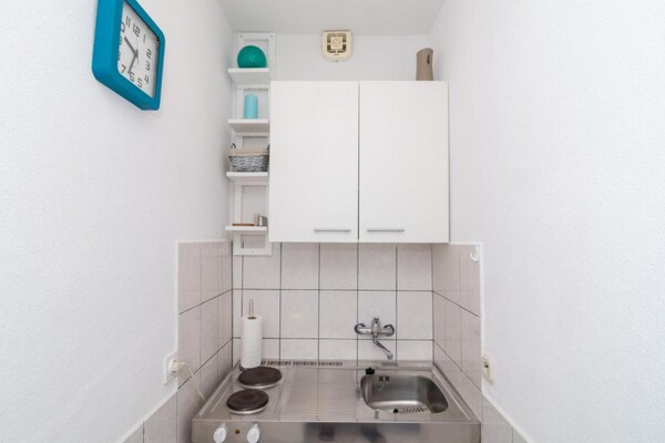 Foto van Apartments Ammos - Studio Apartment with Shared Terrace and Sea View - Kitchen