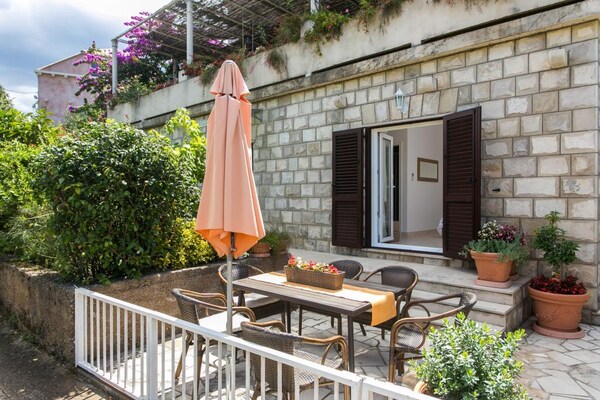 Foto van Apartments Maria Koločep - Two Bedroom Apartment with Terrace and Garden View - terrace