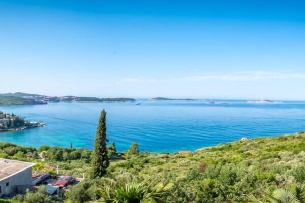 Foto van Apartments & Rooms Barišić - Double Room with Balcony and Garden View (First floor-Soba 8) - Ambiance