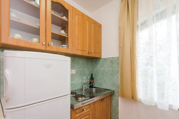 Foto van Apartments Čiovo - Family One Bedroom Apartment with Terrace (A1) - Kitchen