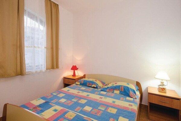 Foto van Apartments Čiovo - Family One Bedroom Apartment with Terrace (A1) - BedRoom