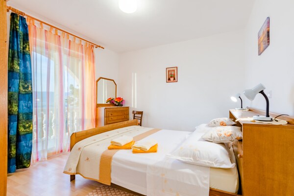 Foto van Apartment Sea Star - Three-Bedroom Apartment with Pool and Sea View - BedRoom