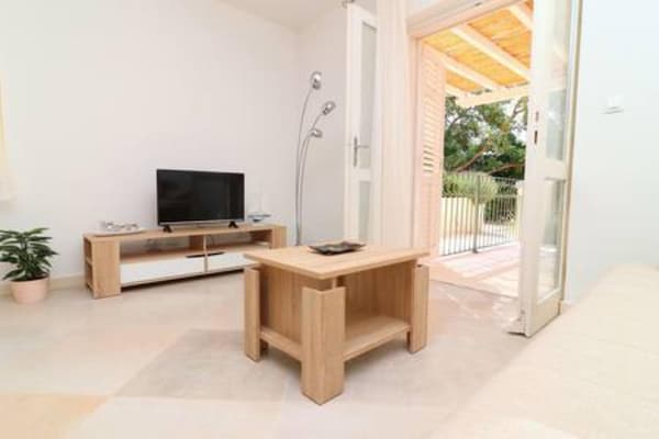 Foto van Apartments Seafront Silence - One Bedroom Apartment with Terrace and Sea View - LivingRoom