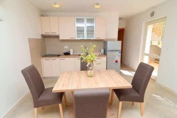 Foto van Apartments Seafront Silence - One Bedroom Apartment with Terrace and Sea View - DiningRoom
