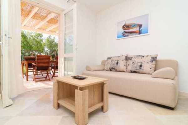 Foto van Apartments Seafront Silence - One Bedroom Apartment with Terrace and Sea View - LivingRoom