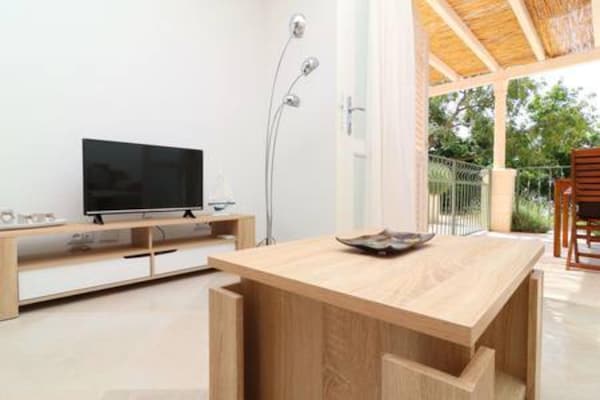 Foto van Apartments Seafront Silence - One Bedroom Apartment with Terrace and Sea View - LivingRoom