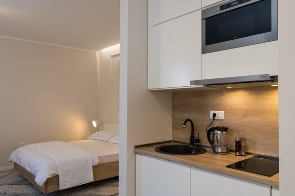 Foto van Apartments Urbis - Premium Studio Apartment with City View (Lijevi) - Kitchen