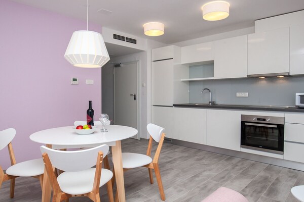 Foto van Apartments Dva Galeba - Standard One Bedroom Apartment with Partial Sea View (106) - DiningRoom