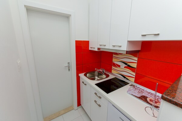 Foto van Apartments Ivana (TR) - Studio with Balcony and Sea View (A4) - Kitchen