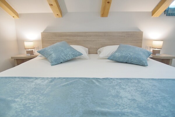 Foto van Apartments Sweet Escape - Studio Apartment with Terrace and Sea View (1) - BedRoom