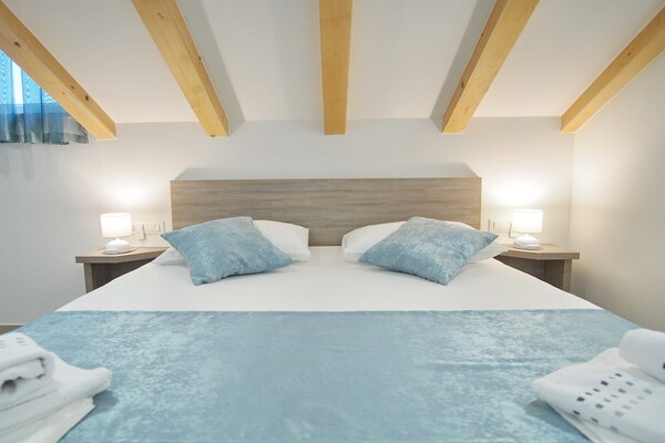 Foto van Apartments Sweet Escape - Studio Apartment with Terrace and Sea View (1) - BedRoom