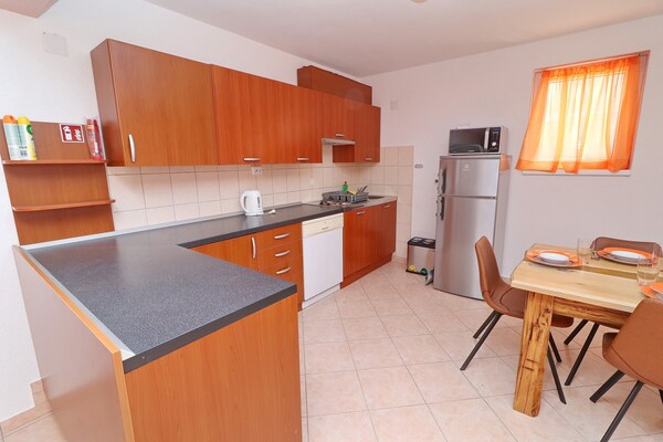 Foto van Apartments Villa Michele-Three Bedroom Apartment with Terrace ( Mandarin ) - Kitchen