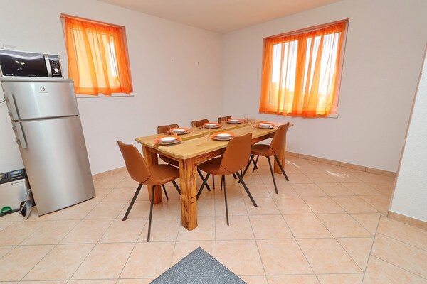 Foto van Apartments Villa Michele-Three Bedroom Apartment with Terrace ( Mandarin ) - DiningRoom