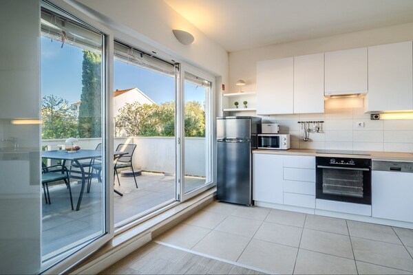 Foto van Apartments Tomy - One Bedroom Apartment with Balcony and Sea view (Apartment 1) - Kitchen