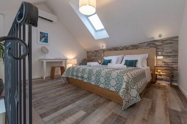 Foto van Luxe kamer met uitzicht op zee - Vakantiehuis in Trogir - BedRoom