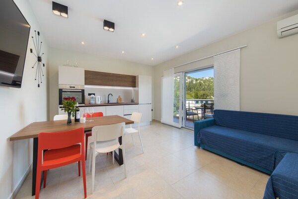 Foto van Apartments Ema-Comfort Two Bedroom Apartment with Sea View ( Fancy ) - DiningRoom