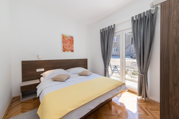 Foto van Apartments Ema-Comfort Two Bedroom Apartment with Sea View ( Fancy ) - BedRoom