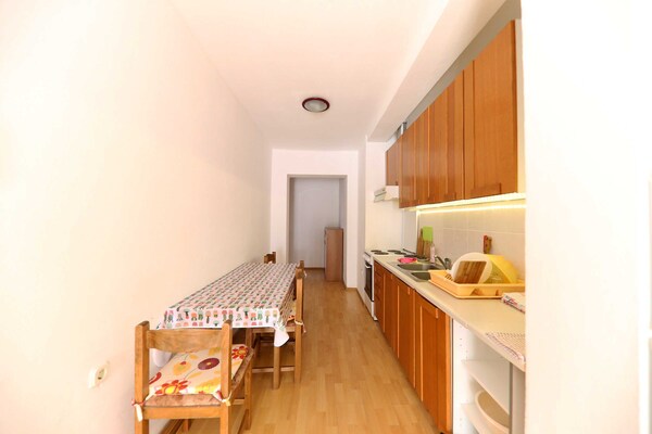 Foto van Apartments Melita - Two Bedroom Apartment with Terrace and Sea View (A1) - Kitchen