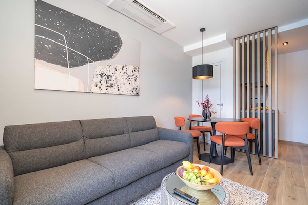 Foto van Apartments Villa Royale - Deluxe One Bedroom Apartment with Sea View - LivingRoom